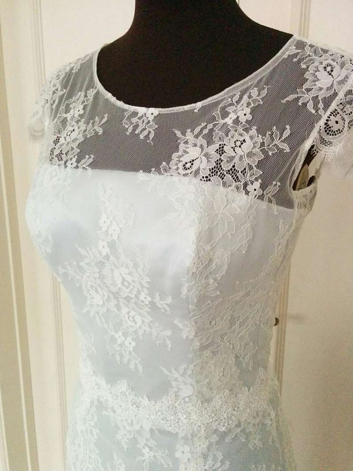 blue silk bespoke wedding dress finished and ready to go, lace overlay and round neckline