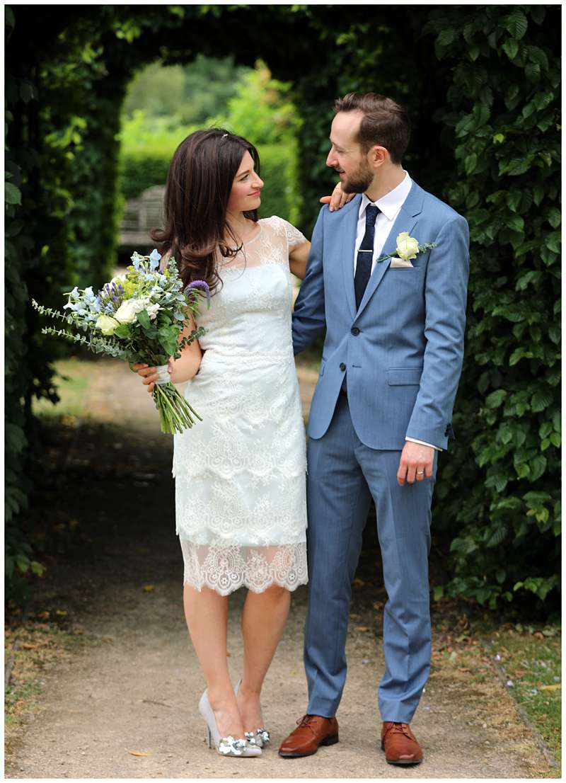 pale blue cocktail wedding dress with scalloped lace overlay