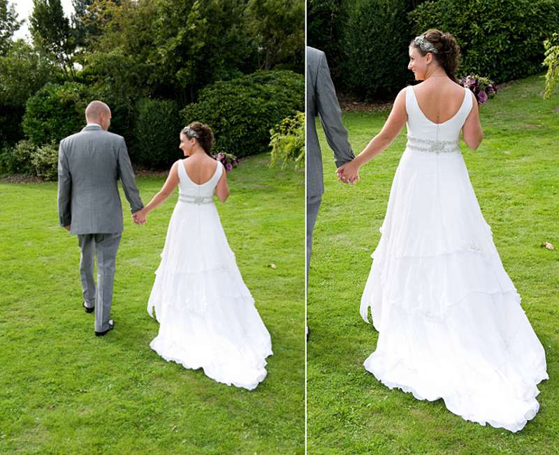 bride walks on lawn, layered silk train and belt