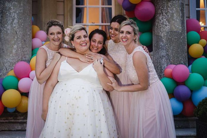 bride and bridesmaids in star tulle plus size wedding dress