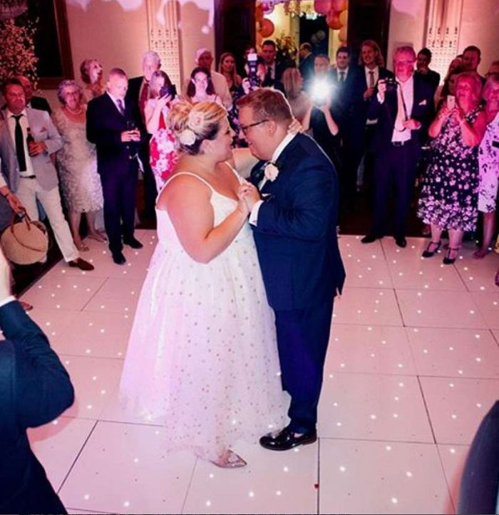 bride on dance floor in bespoke tulle wedding gown