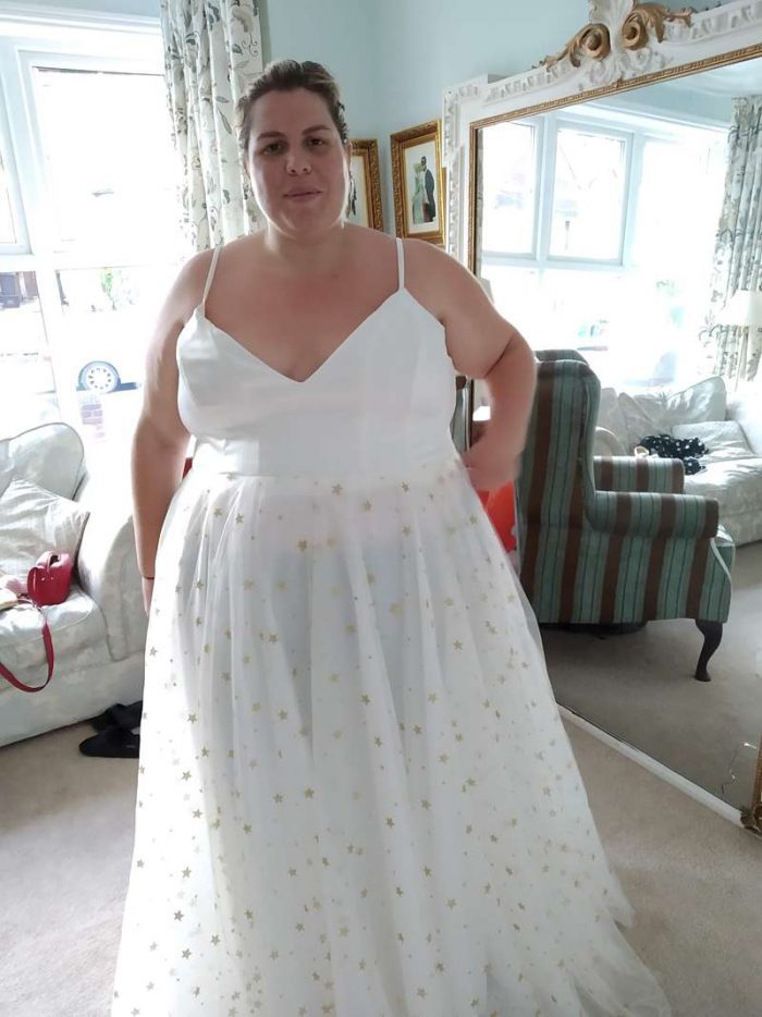 fitting picture with plus size bride strappy dress