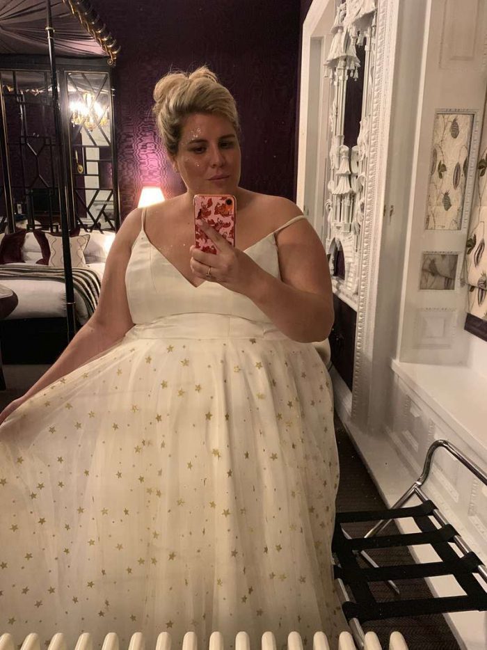 plus size bride selfie in bridal suite