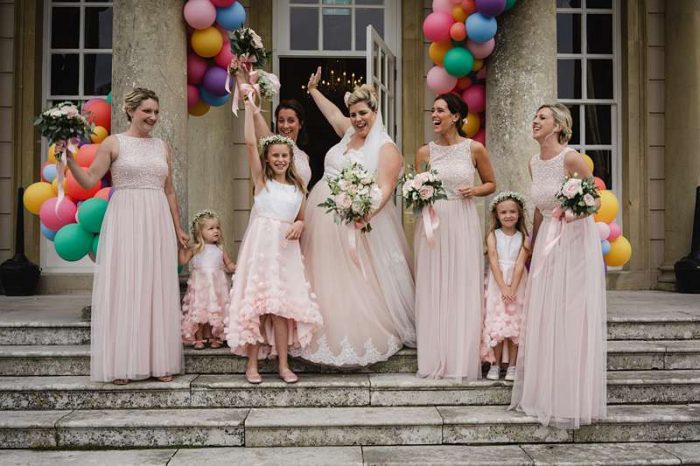 blush colour wedding party on steps