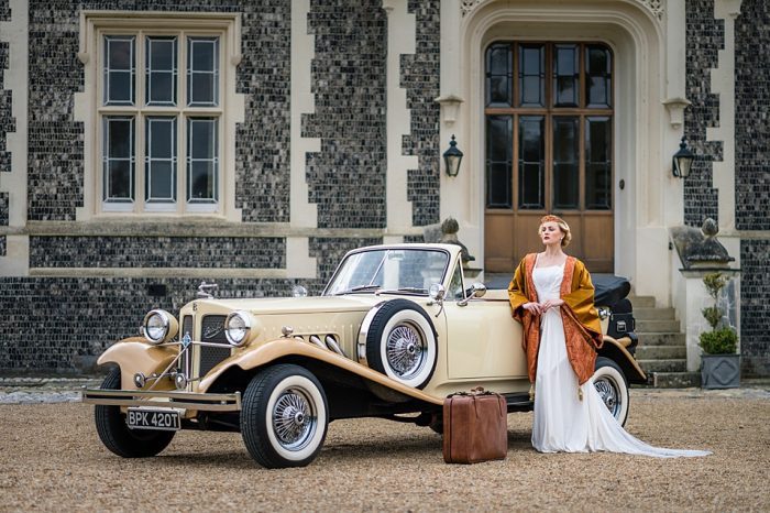 1930's classic car for wedding with art deco wedding dress and velvet coat