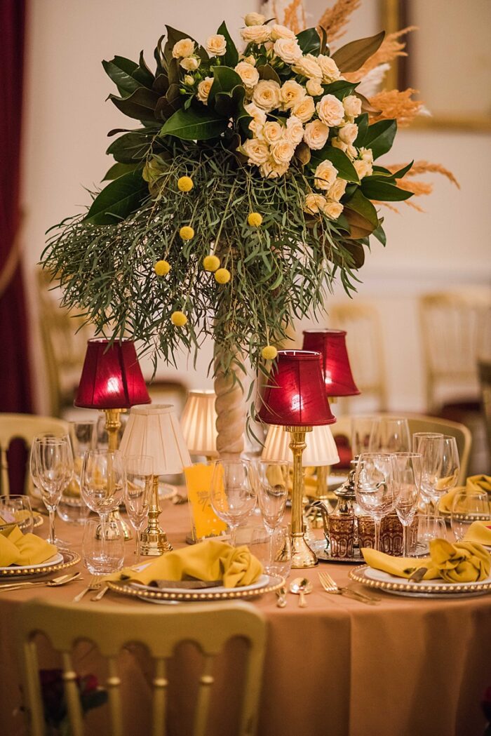 ochre and burgundy wedding tablescape