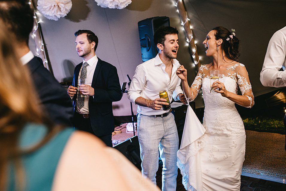 Wrist loop and something blue on bespoke wedding dress