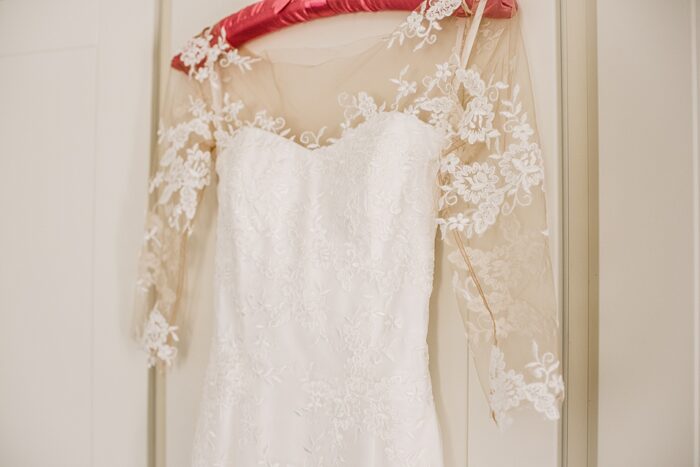 Finished dress hanging up lace and satin