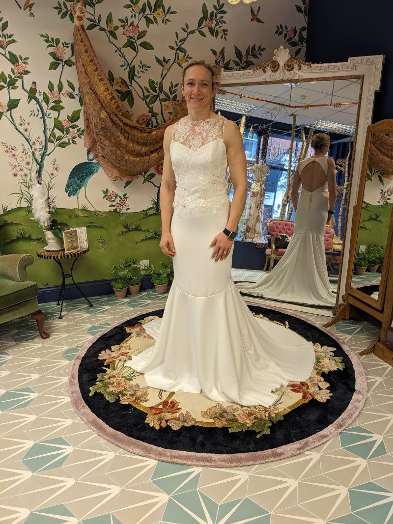 Felicity Westmacott bride in her partly made wedding dress in the fitting room