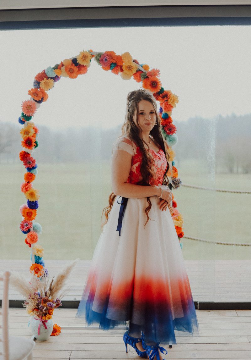 bright colourful bride surrey uk dried floral flower arch pink lace tea length dip dye dress dopamine dressing