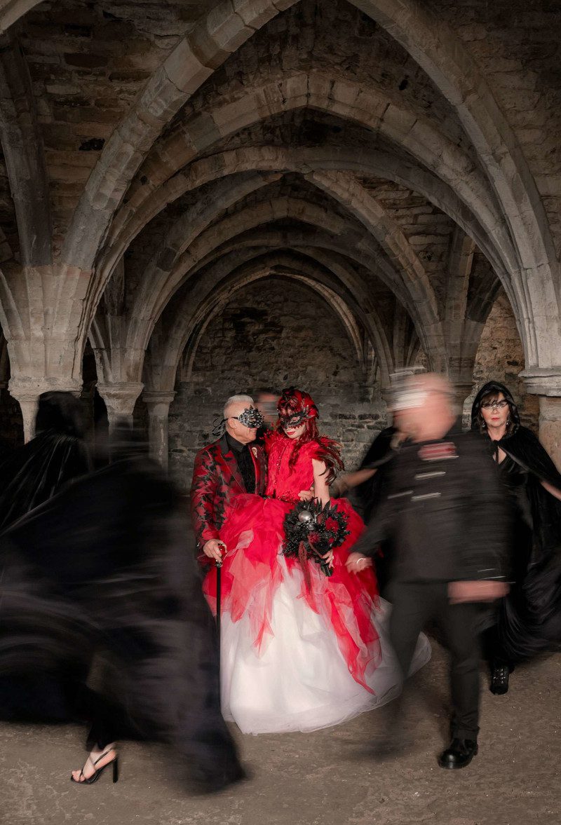 classic fantasy gothic bespoke custom wedding dress crypt alternative couple bride