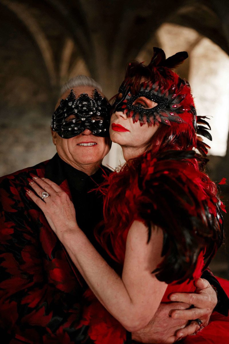 mature bride gothic alternative alt couple wedding feather wings leather mask