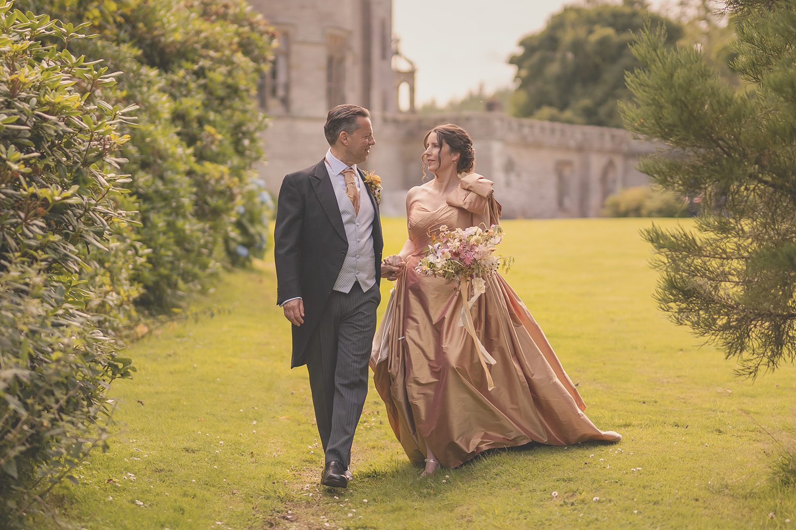 bespoke bronze gold wedding dress statement shoulder bow mature bride