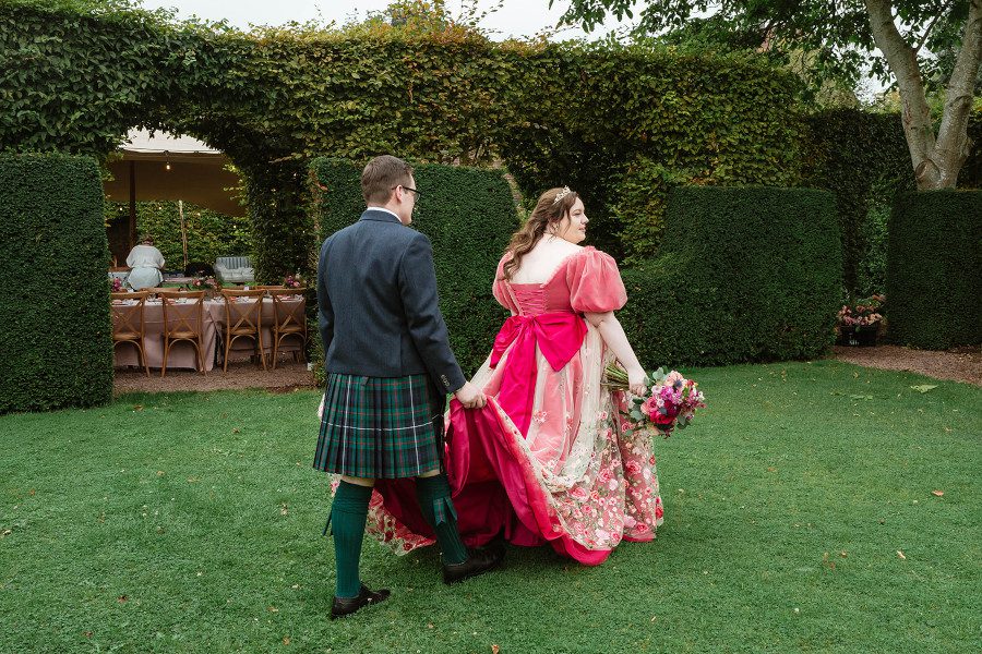 scottish kilt groom plus size bride long floral train pink bow romantic historical period inspired wedding dress