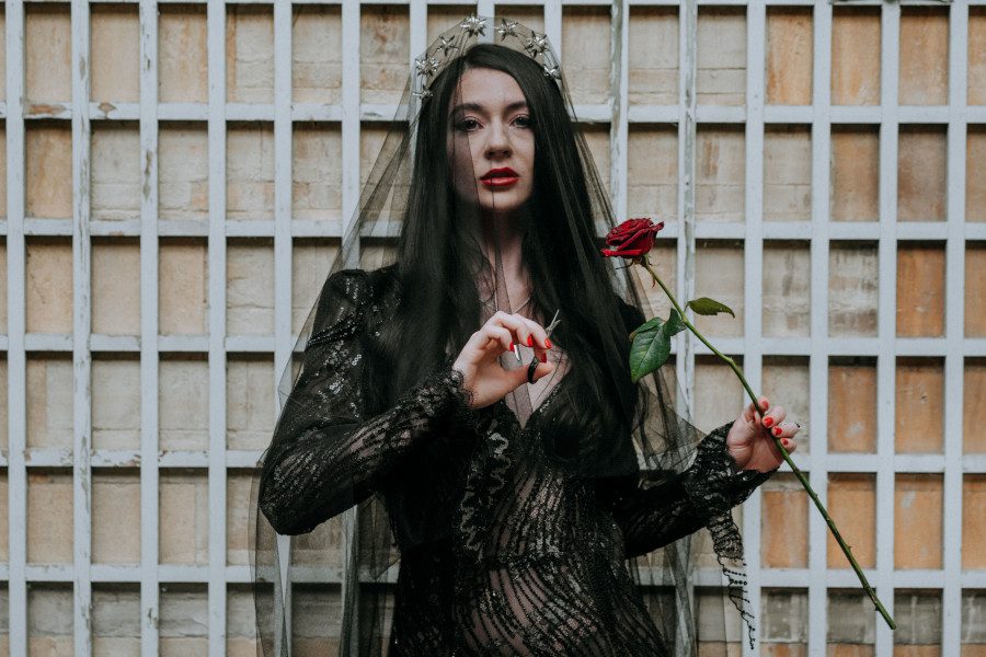 sheer sequin gothic morticia addams family wedding dress long black hair cutting rose