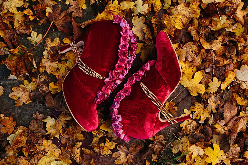 bespoke velvet wedding boots stilettos roses on bed of leave