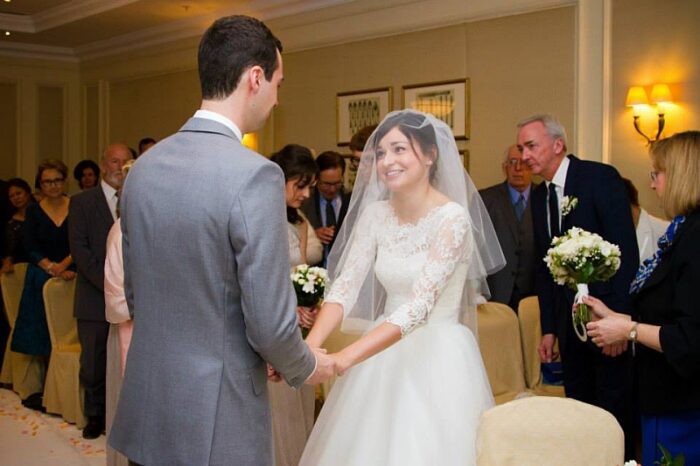 blusher veil and traditional lace wedding dress