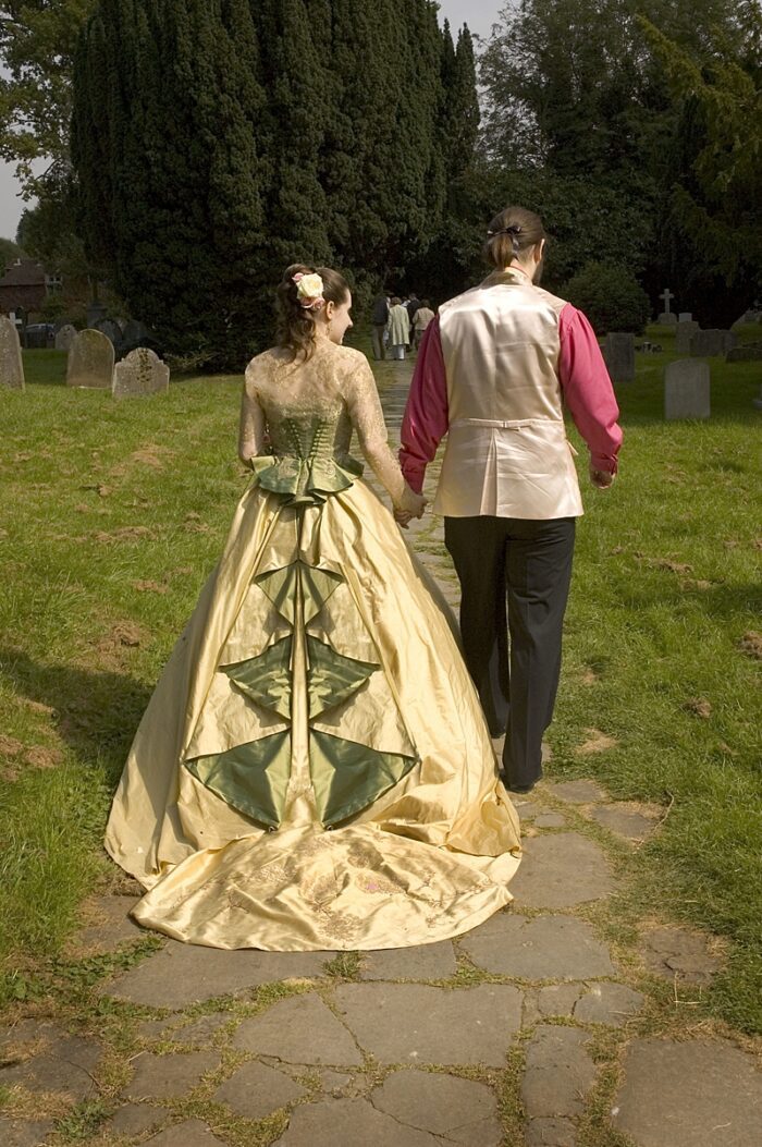 green and gold waterfall train wedding dress