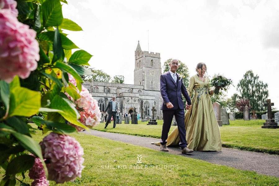 outdoor gardens manor house stone church uk england bride groom elegant wedding outfit dress