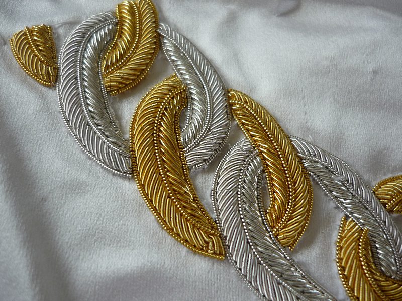 close up bullion embroidery silver and gold chain