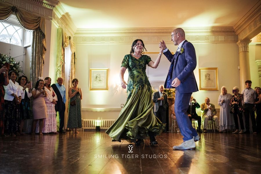 older mature bride groom couple embroidered green wedding dress