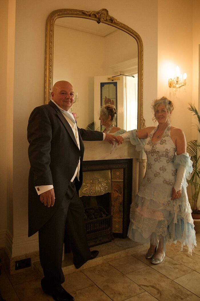wedding couple with mirror alternative wedding dress