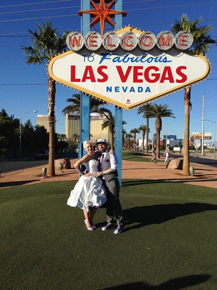 las vegas wedding bride and groom white and purple