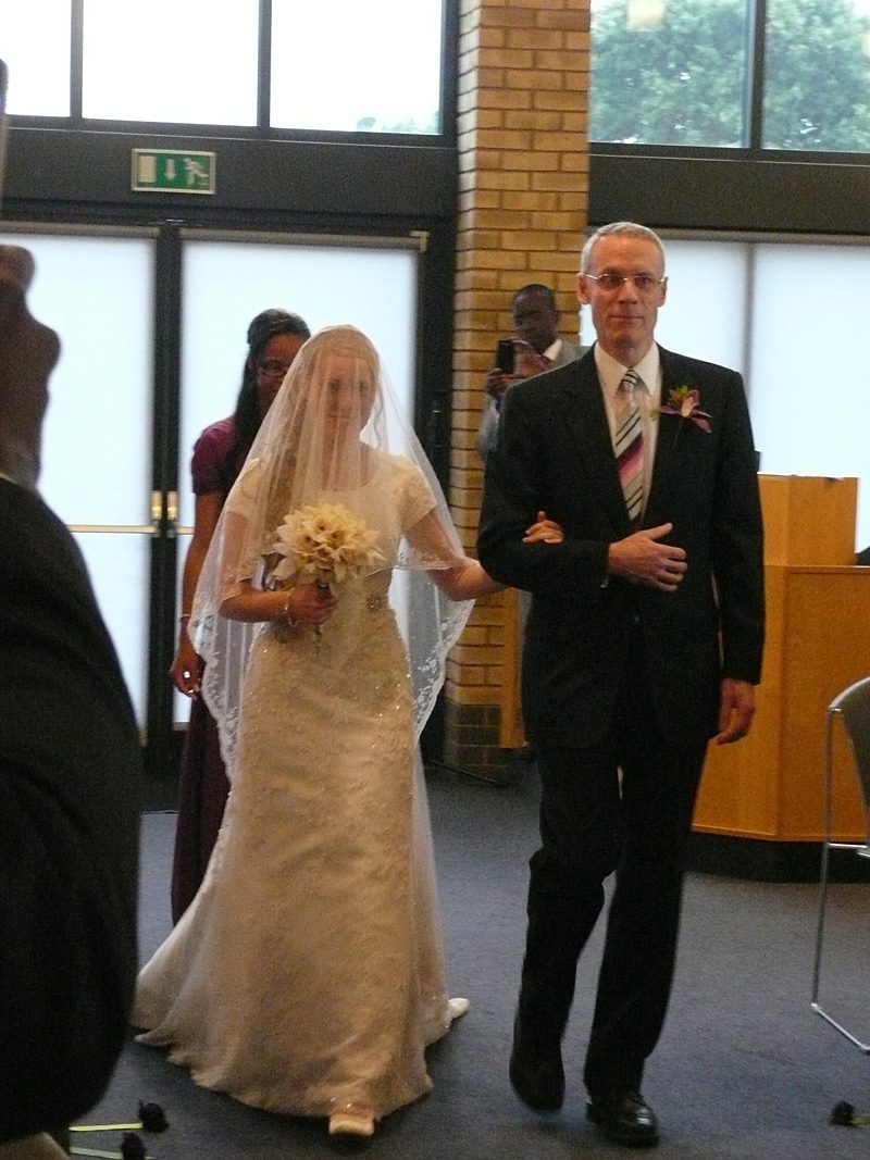 traditional modest wedding dress with antique veil