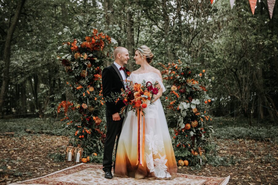autumn forest woodland wedding bride groom floral flower alter pillars arch bespoke custom felicity westmacott