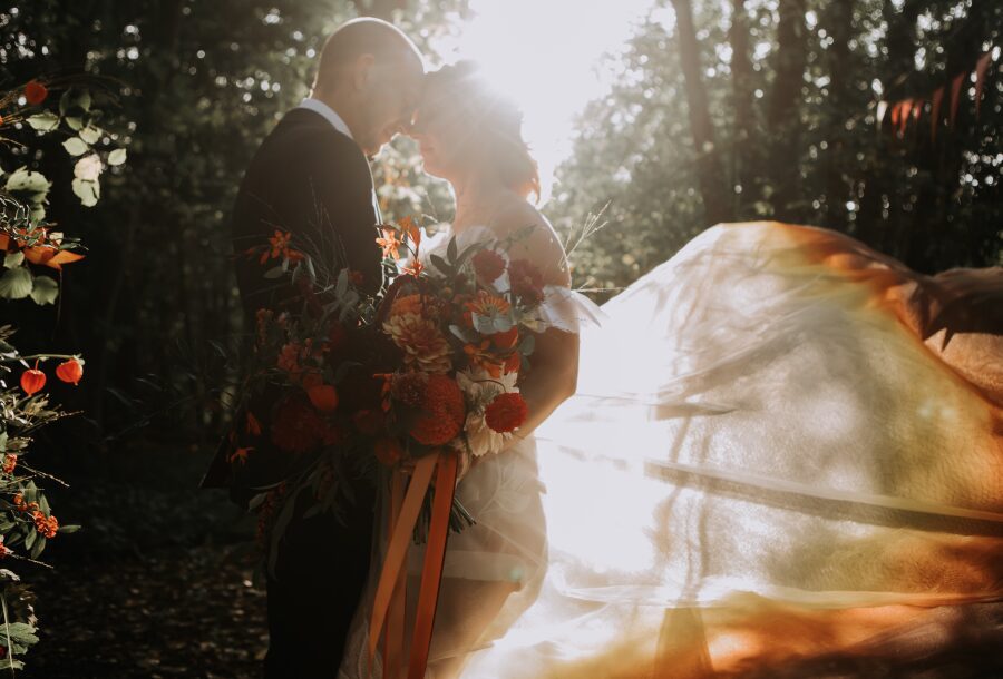 woodland outdoor nature red burnt orange rust gold autumnal colours wedding dress