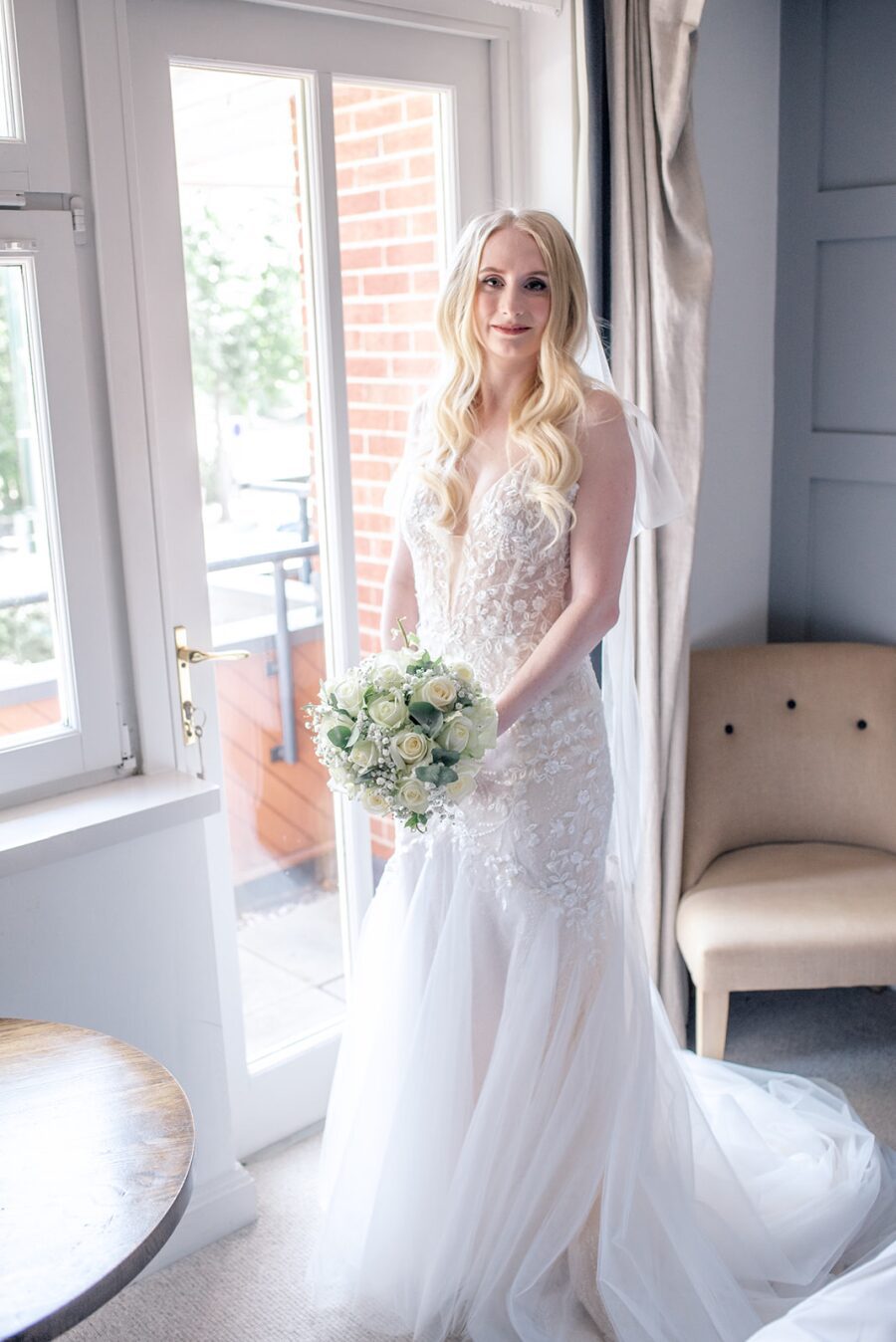 sheer layered ivory tulle chiffon plunge low neckline cream ivory beige nude wedding dress