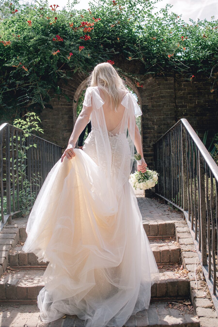 low illusion back shoulder bows soft romance floaty sand wedding dress hourglass