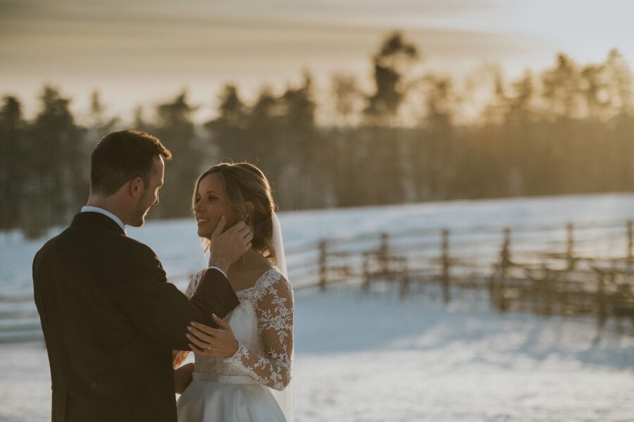 snowy winter wedding day couple photos almost off shoulder boat neckline