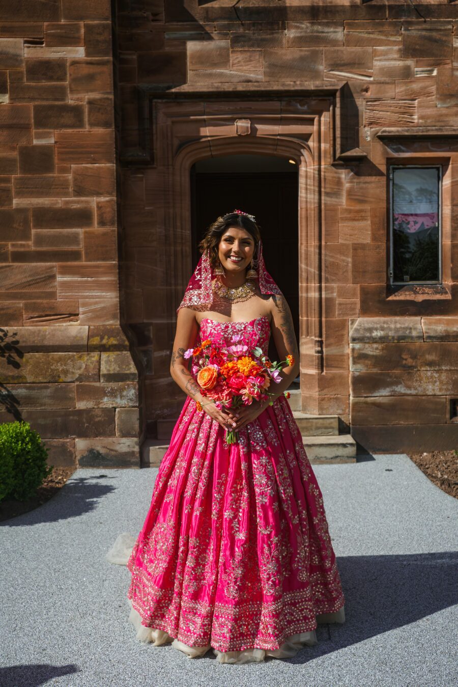 bespoke floor length pink gold sleeveless indian inspired modern traditional wedding dress