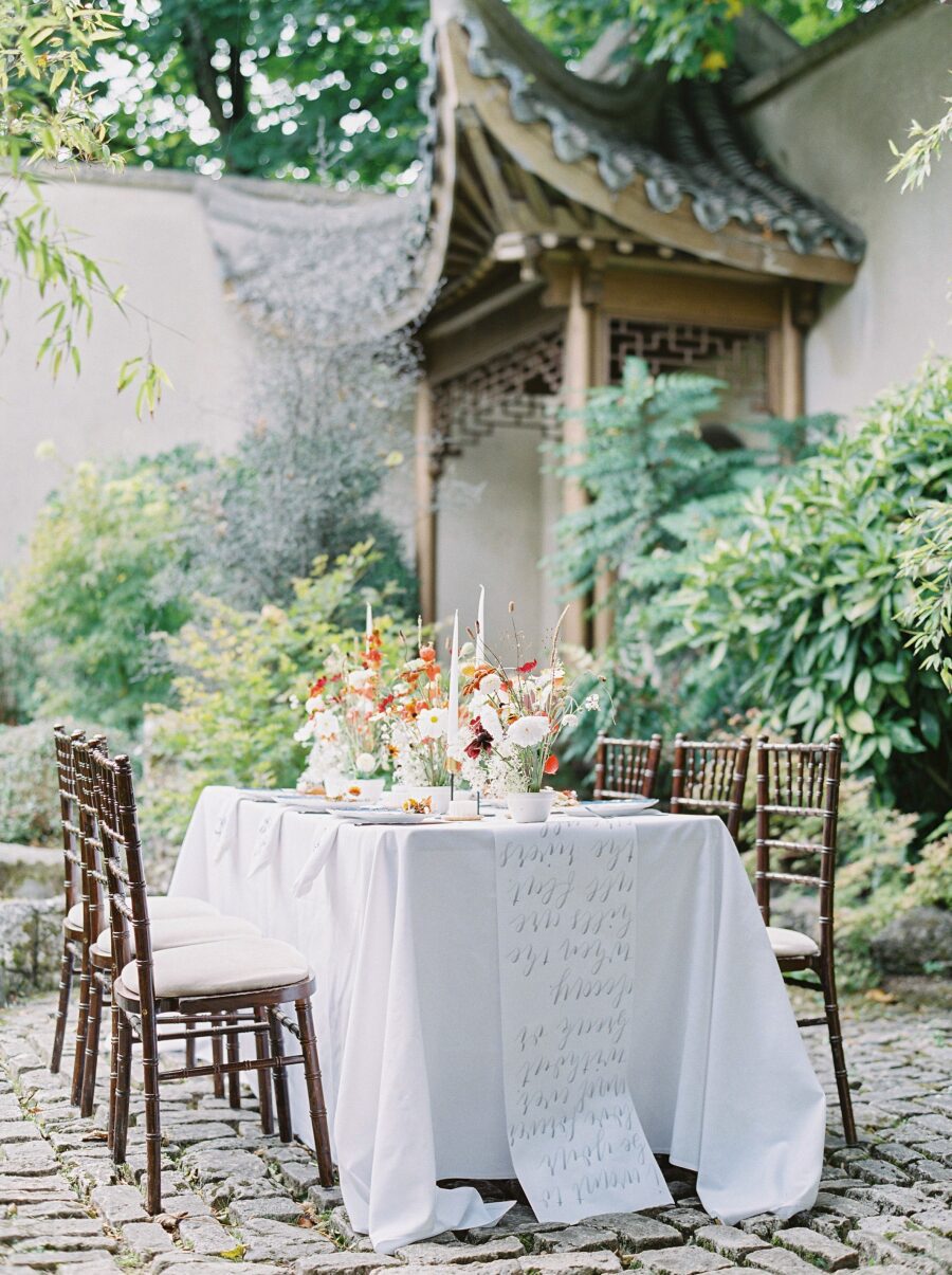 asian inspired wedding table oriental architecture bamboo courtyard