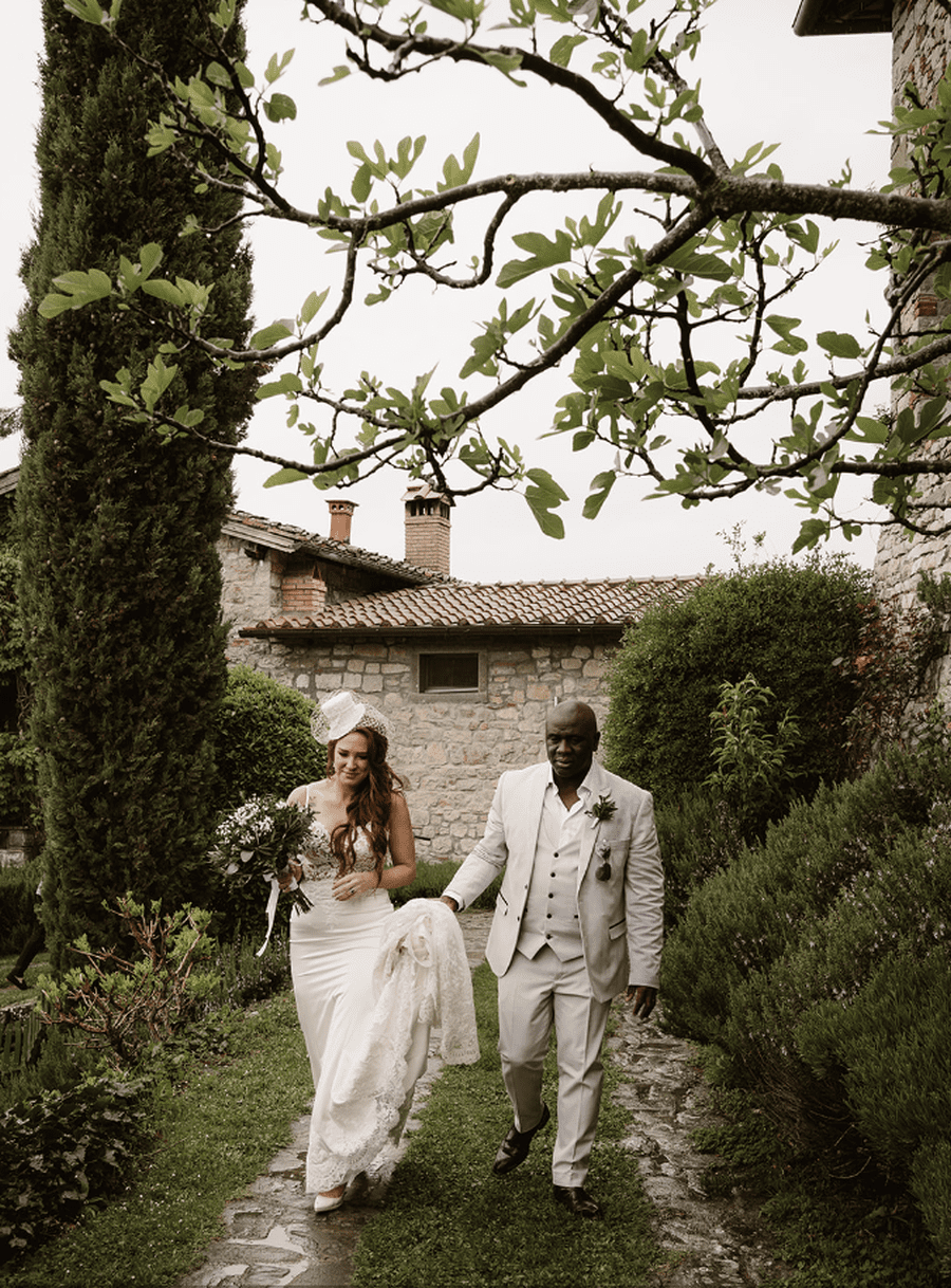 outdoor european italian tuscany villa cypress trees wedding mixed race couple bride groom
