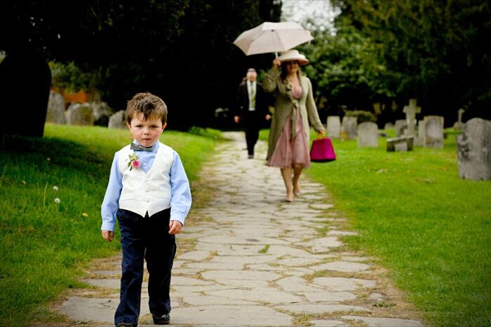 custom page boy waistcoat on a church path
