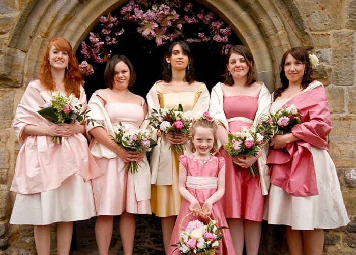 bespoke short bridesmaids dresses surrey in shades of pink, white and gold