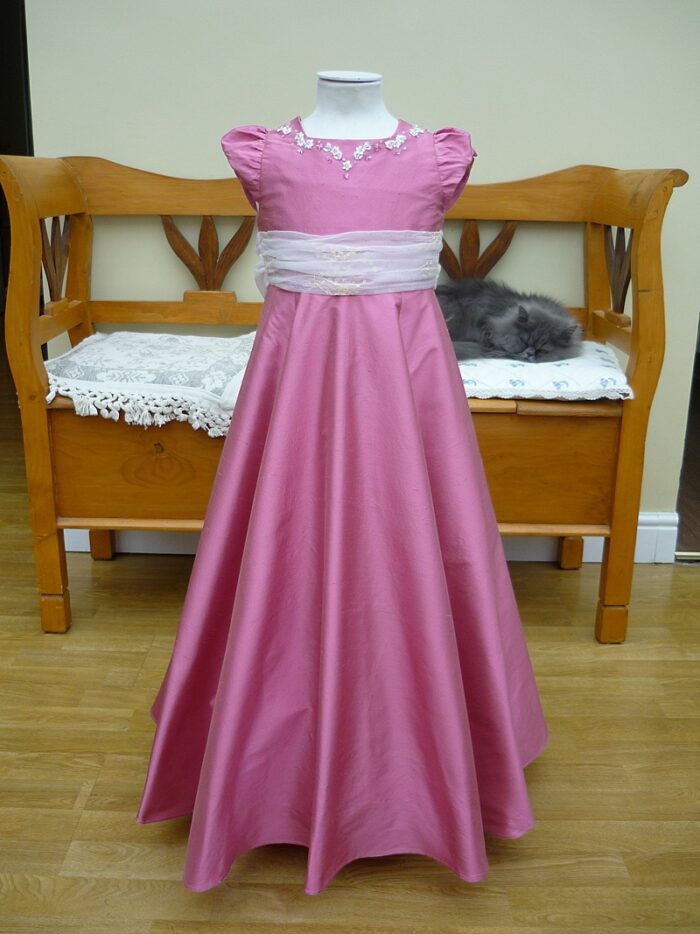 made to measure flower girl silk dress on stand with puff sleeves