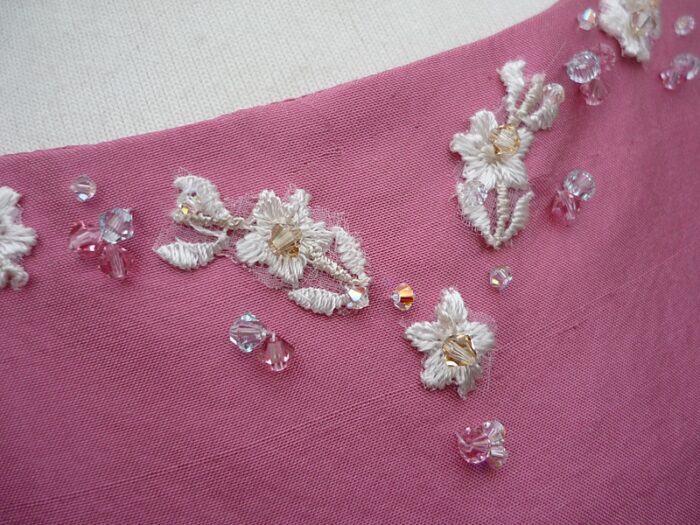 hand applique and swarovski crystals to bespoke child bridesmaid dress