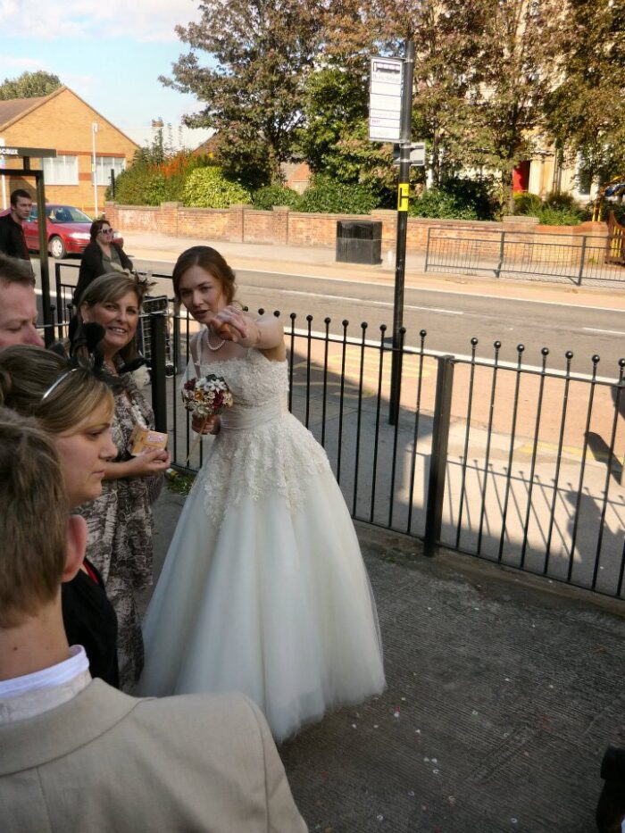 bride points out her dressmaker