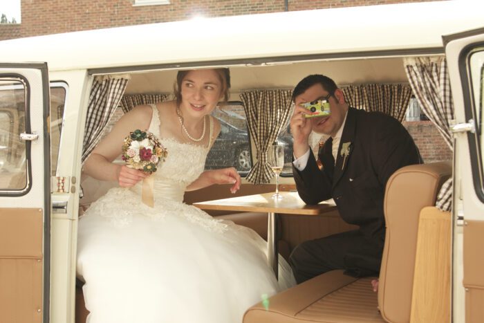 vintage style wedding dress in campervan