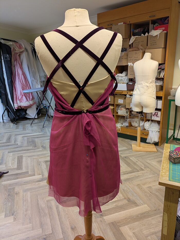 criss cross back straps pinned on