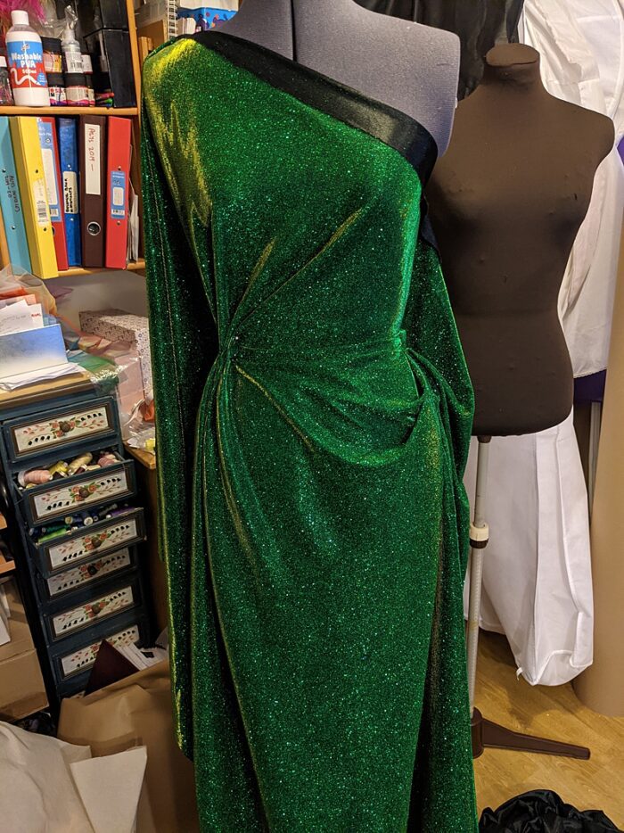 green asymmetric glitter dress