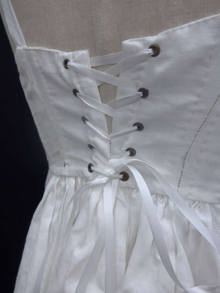 lace up back eyelets and ribbon