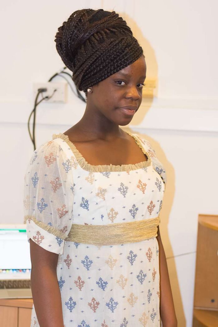 hand sewn regency finished dress on model