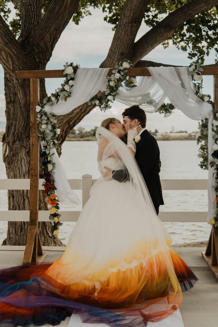 yellow and burgundy dip dye wedding dress with veil