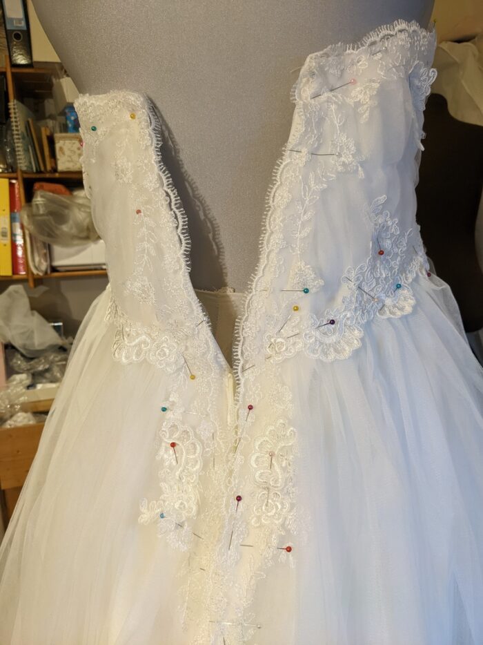 pinned lace on bodice